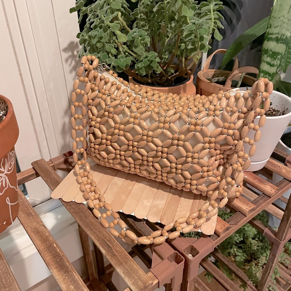 The Saks 1970s style wooden beaded purse